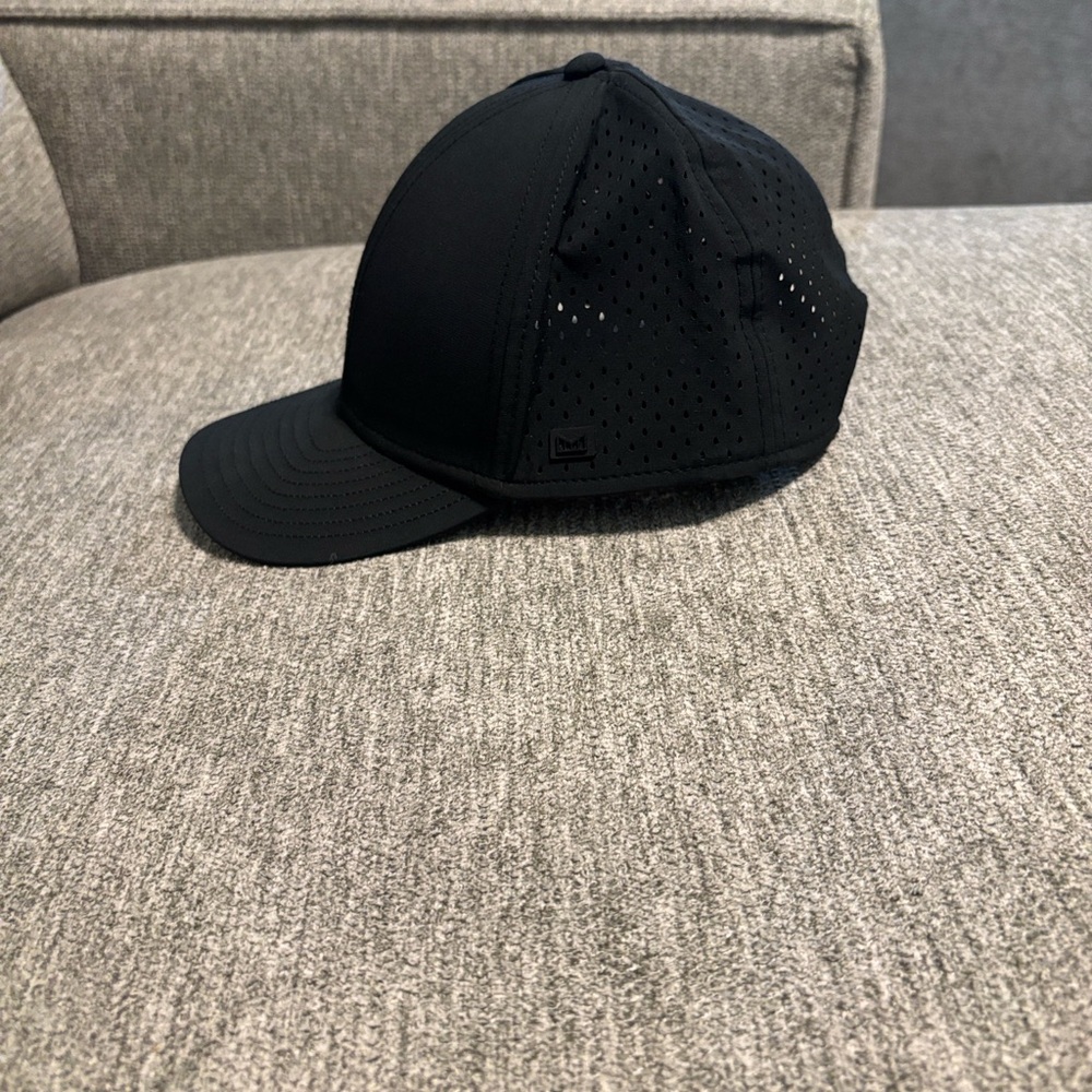 Melin A Game Hydro Black Hat-Like New.  6 others to sell.  All like new.